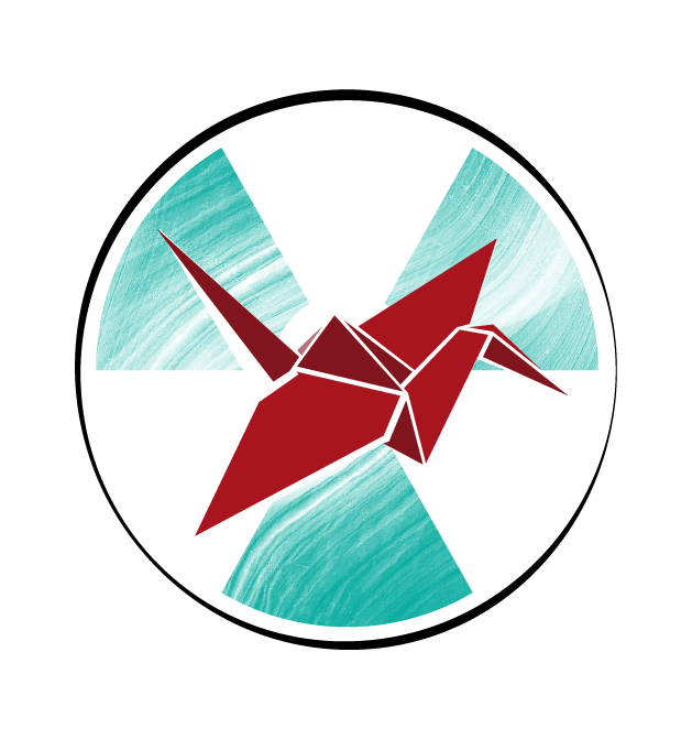 Image of a radiation trefoil sign superimposed by an origami crane